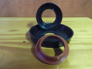3 Pneumatic Seals On A Wooden Table | Fuzion Trading